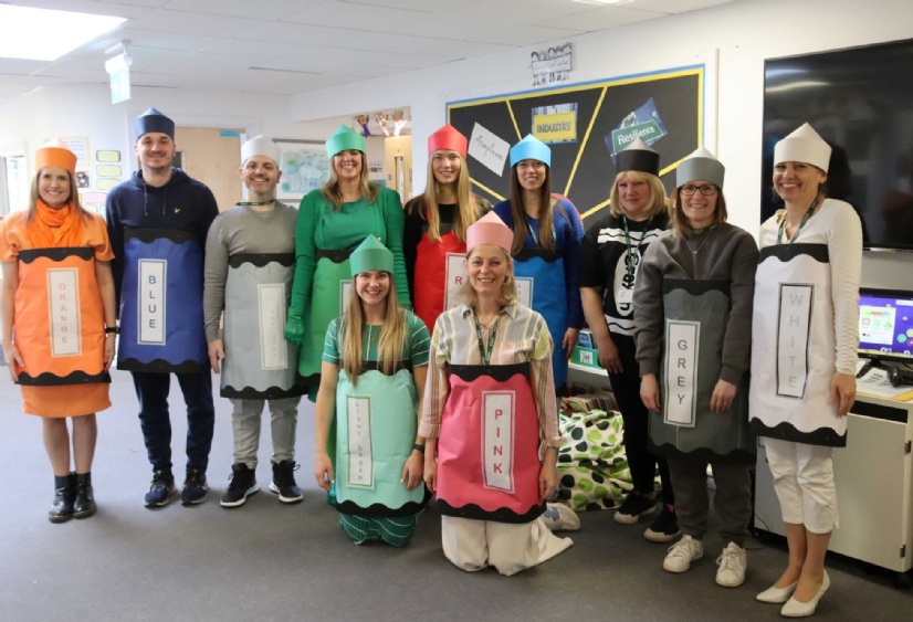 Teachers in Lower School dress up as crayons from the book The Day The Crayons Quit